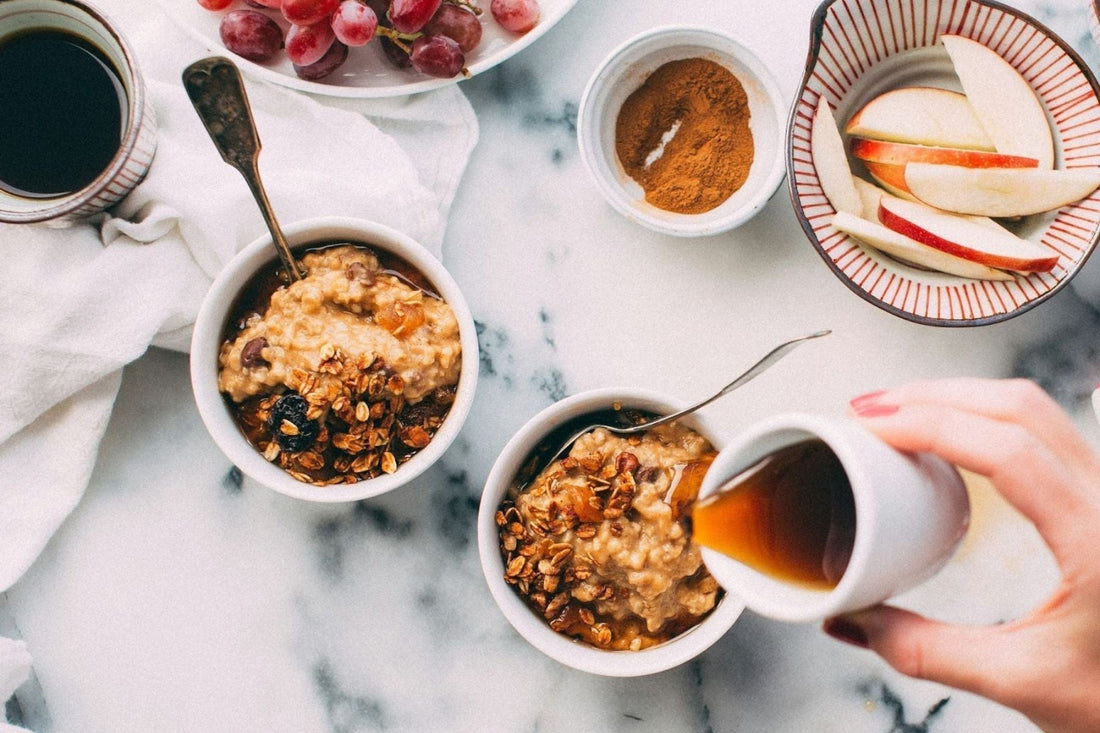 Honey being poured into Cinnamon Oats