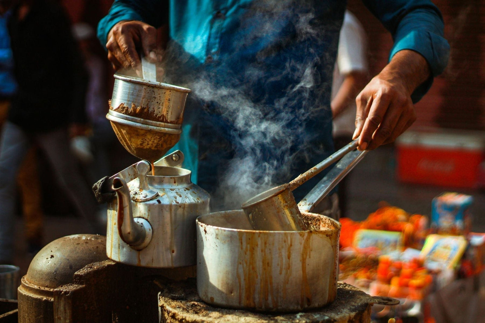 Tea being made in a saucepan and kettle
