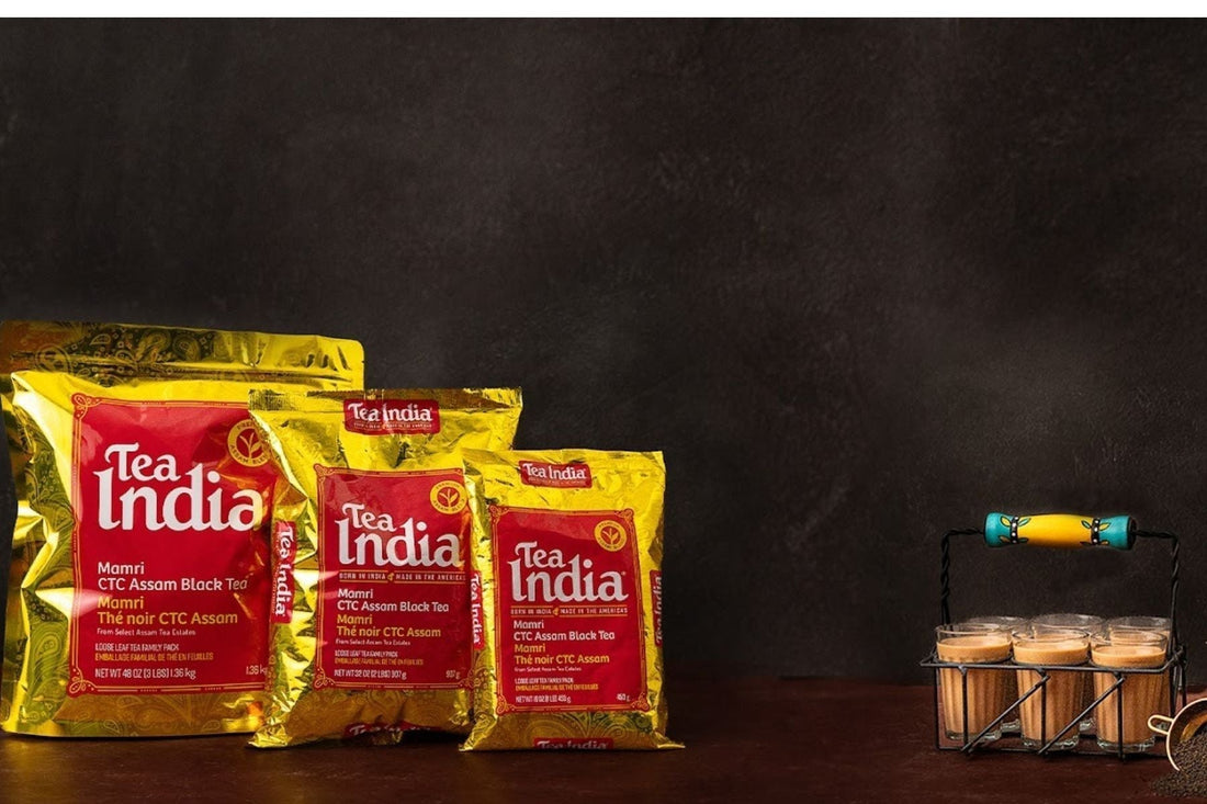 Tea India one pound, two pound and three pound packs alongside six glasses of teas.