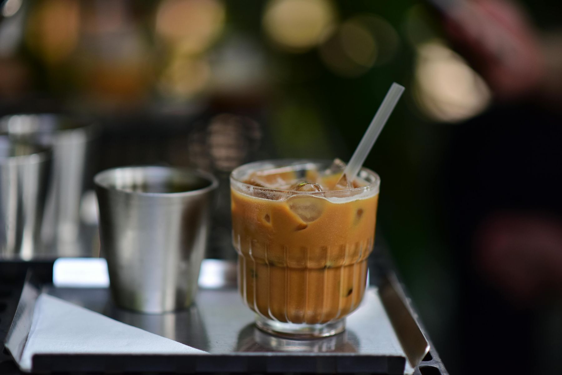 A glass of Iced Lemongrass Chai Tea made with Tea India Lemongrass instant premix