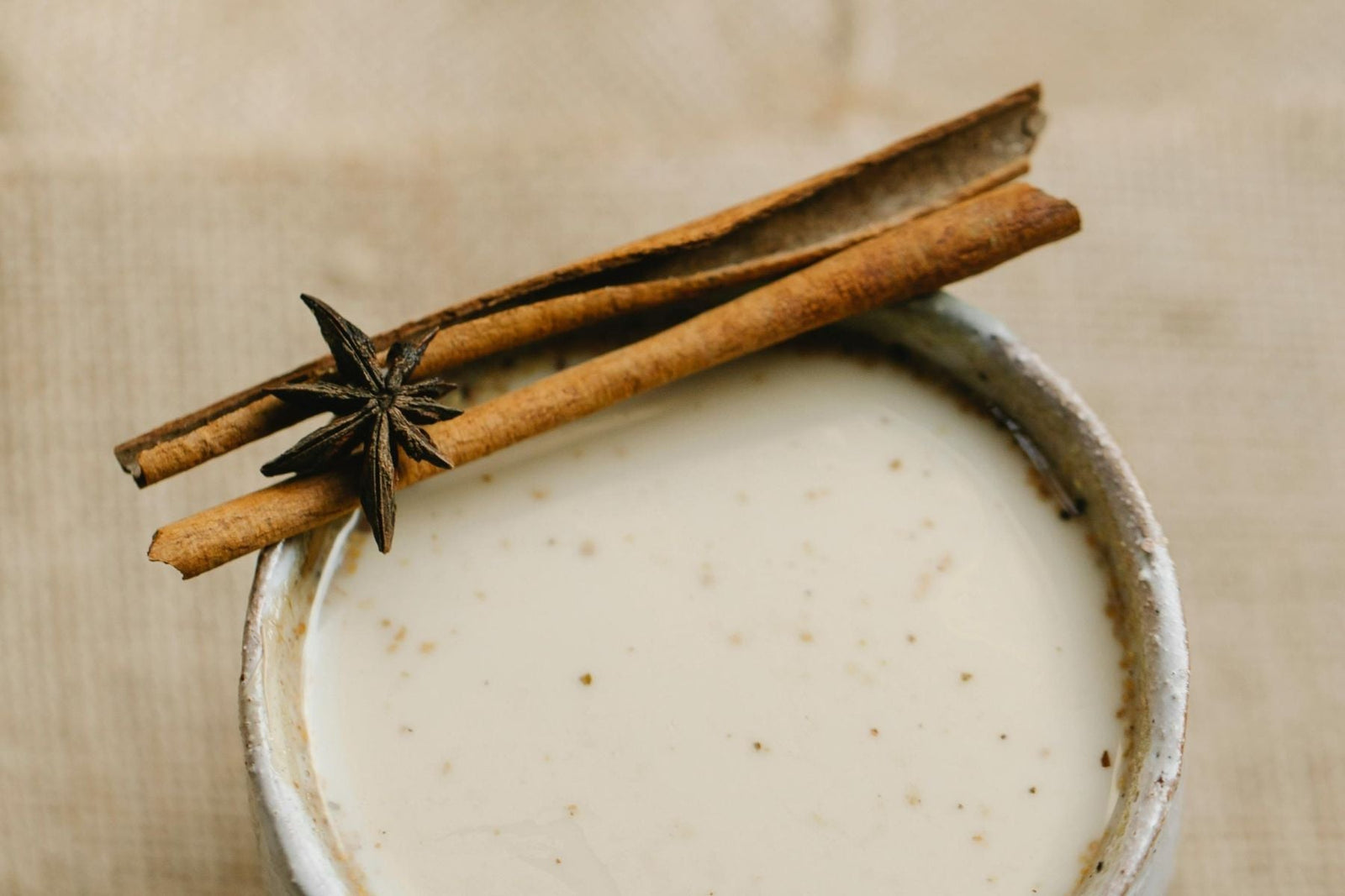 Creamy chai latte topped with cinnamon stick