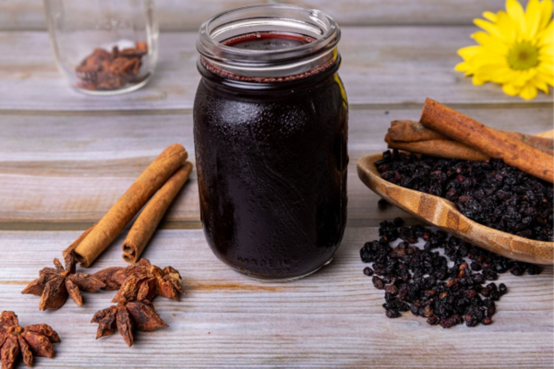 Jar of Tea syrup with pepper and other spices.