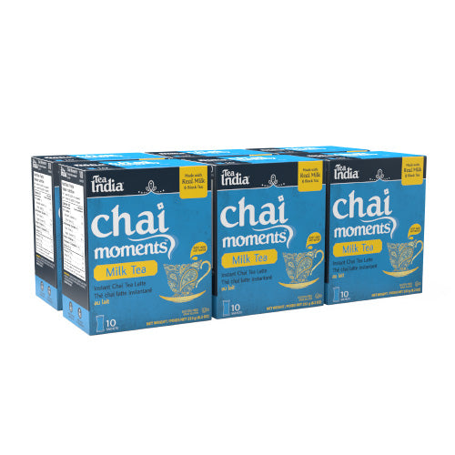 Six boxes of Tata India Chai Moments Milk Tea on a white background