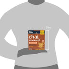 Tea India Chai Moments Cinnamon package on a gray shirt with size indication.