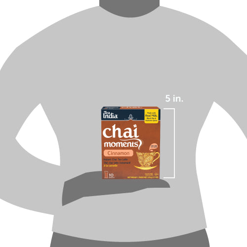 Tea India Chai Moments Cinnamon package on a gray shirt with size indication.