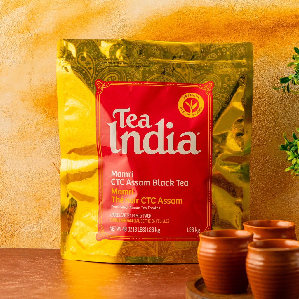 Tea India packaging with a yellow background and decorative elements