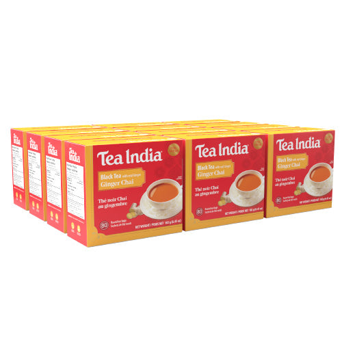Twelve boxes of Tea India ginger chai tea on a white background