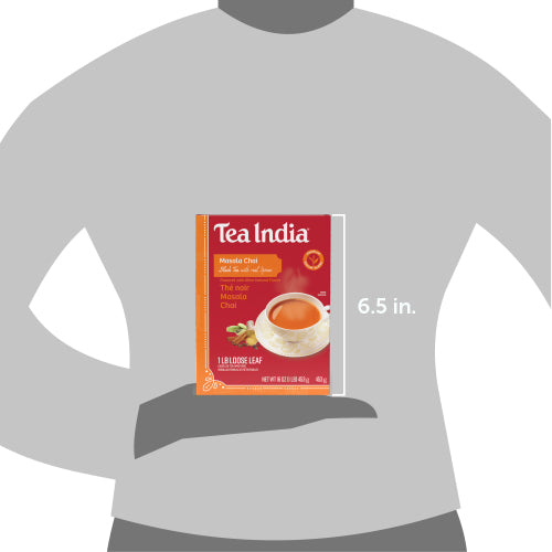 Tea India package held by a hand with dimensions indicated on a gray background