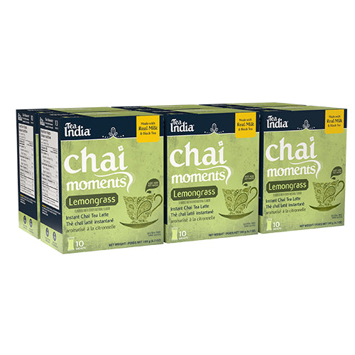 Six boxes of Chai moments Lemongrass instant chai tea latte from Tea India on a white background.