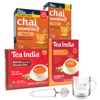 Tea India chai and black tea products with a glass mug and tea strainer on a white background