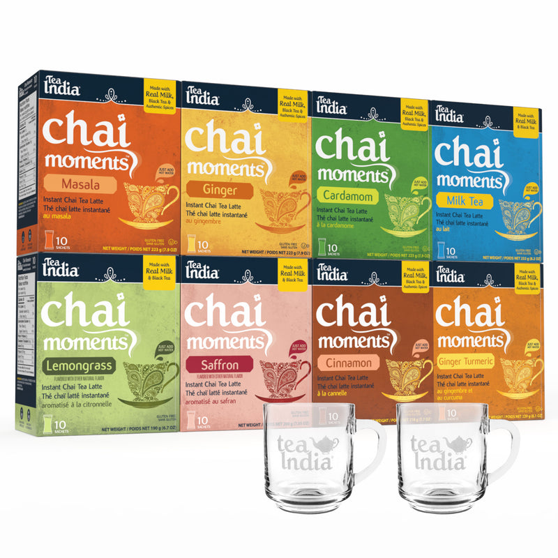 Tea India Ultimate Chai Moments Gift Bundle featuring Masala, Ginger, Cardamom, Milk Tea, Lemongrass, Saffron, Cinnamon, and Ginger Turmeric instant chai lattes and 2 glass Tea India mugs