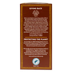 Tea India Dirty Chai box side panel showing Giving Back partnership with Action Village India and Rainforest Alliance certification.