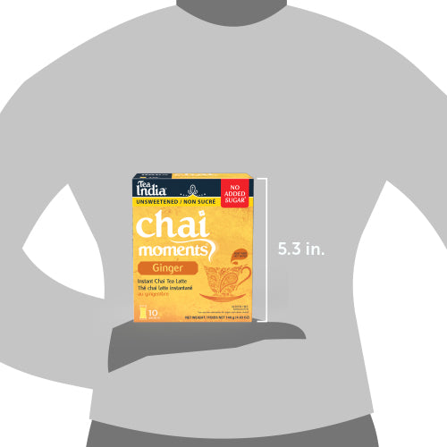 A box of Tea India Chai Moments Ginger unsweetened instant latte held in a hand for size comparison, with a height of 5.3 inches noted