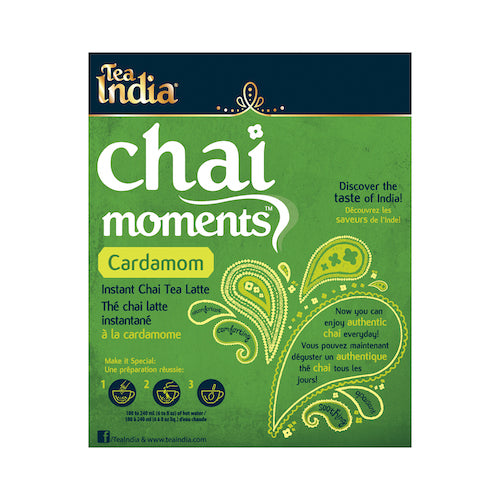 Front label of Tea India cardamom chai moments instant latte box with brewing instructions and decorative spice graphics.
