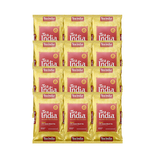 Twelve packs of Tea India Mamri CTC Assam Black Tea in gold and red packaging